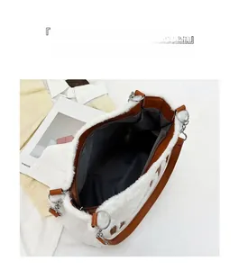 Top view of large plush tote bag showing spacious interior with dark grey lining