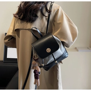 Retro black leather mini backpack with golden lock and a cute plush rabbit pendant charm