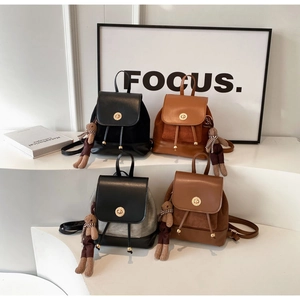 Mini leather backpacks with metal buckles, drawstring closures and cute teddy bear charms