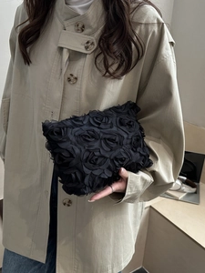 Elegant black evening clutch with 3D fabric rose floral design for formal occasions