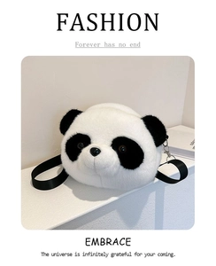 Detail of cute panda plush crossbody bag with black fabric strap and silver metal hooks