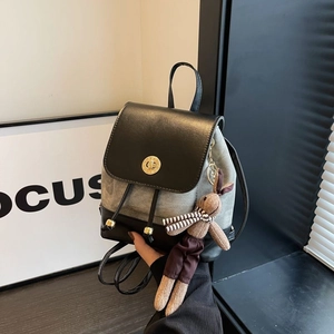 Retro grey canvas and black leather mini backpack with a cute rabbit keychain