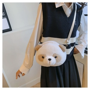 On-body view of a cute plush panda crossbody bag with adjustable textile strap