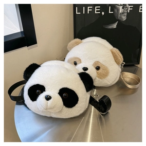 Detail of plush panda crossbody bag with soft faux fur texture and nylon shoulder strap