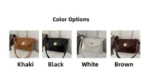 Detail view of khaki, black, white, and brown vintage bags with gold circular buckle