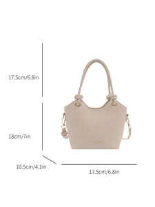 Chic beige handbag with knotted handle and gold-tone strap shown in a full front view