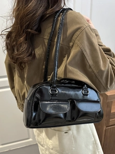 Retro black glossy leather shoulder bag with double pockets and silver metal rings