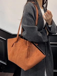 Minimalist caramel brown suede tote bag with knotted strap and large capacity