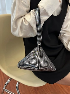 Elegant triangular evening bag with iridescent crystals and a rhinestone handle
