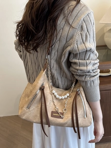 Vintage khaki suede shoulder bag with pearl chain straps and elegant retro design