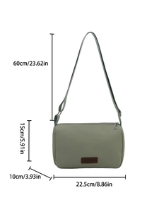 Sage green rectangular crossbody bag with dimensions showing size and fashion label