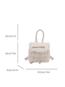 White PU leather mini backpack with ruffle edge and bow detail showing product dimensions