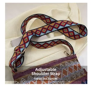 Close-up of bohemian jacquard wide strap with geometric patterns and golden metal buckle
