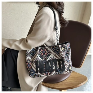 Ethnic style canvas tote bag featuring geometric patterns and HOOTO 3D letter branding