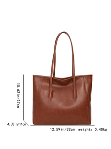 Borsa tote vintage marrone in similpelle con dimensioni su sfondo bianco puro