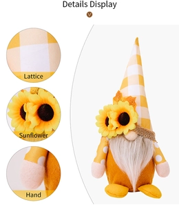 Détails du gnome d'automne avec chapeau à carreaux jaunes, tournesol et barbe blanche