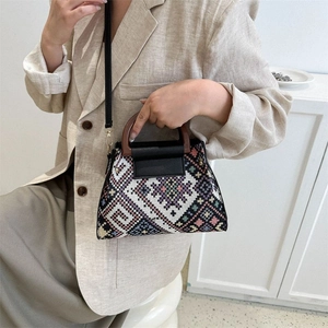 Ethnic geometric canvas handbag with round wooden handles and adjustable shoulder strap