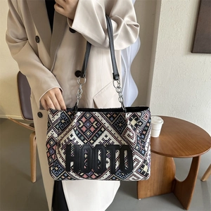 Ethnic style woven canvas tote bag with HOOTO logo and leather straps for women