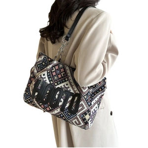 Ethnic knit tote bag with HOOTO leather applique and metallic chain shoulder strap