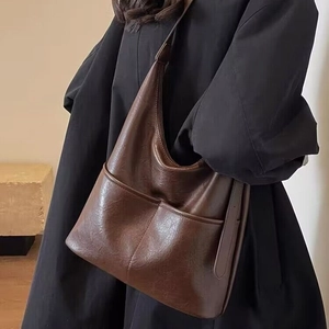 Classic dark brown pebble leather tote bag for women with spacious front pockets