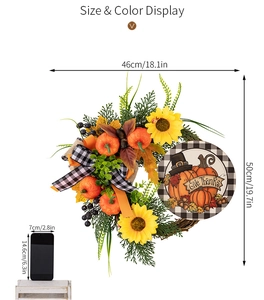Size display of Thanksgiving pumpkin wreath with Give Thanks sign and sunflower
