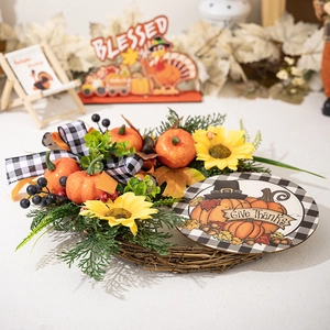 Detail of Give Thanks pumpkin wreath with sunflowers and black-white plaid bow