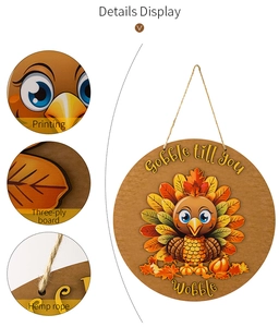 Close-up of Thanksgiving turkey door sign showing wood grain and rope hanging detail