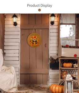 Detail of round Thanksgiving wooden sign featuring a turkey and Gobble text on a front door