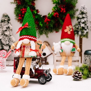 Close-up of knit textures and gingerbread details on Christmas gnome dolls