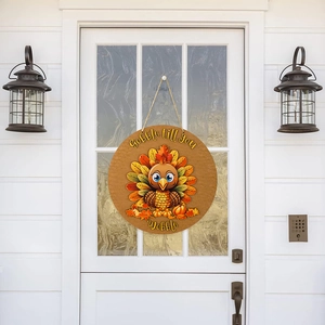 Wooden Thanksgiving turkey door sign with Gobble till you Wobble text and hanging rope