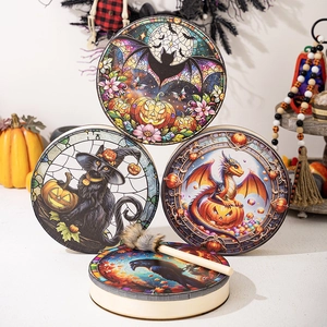 Artistic Halloween percussion drums with bat, cat, and dragon motifs and wooden drumstick