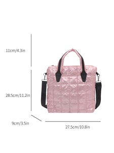 Pink quilted bucket bag with black handles and adjustable shoulder strap for women