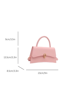 Pink trapezoid handbag with gold lock and dimensions 23x13.5x8.5cm shown on white background