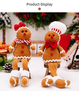 Detailed view of gingerbread plush dolls with chef hats in a festive Christmas scene