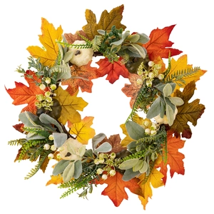 Autumn harvest wreath with white pumpkins, maple leaves and berries for front door decor