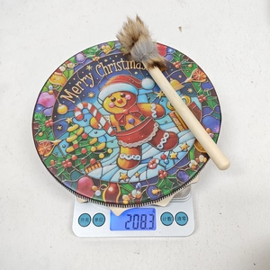 Macro detail of Merry Christmas gingerbread man tray with wooden brush on a scale