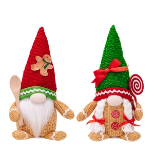 Pair of light-up gingerbread gnomes with red and green knit hats for Christmas decor