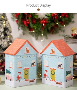 Blue dog-themed Christmas cottage tin box featuring festive santa and pet illustrations