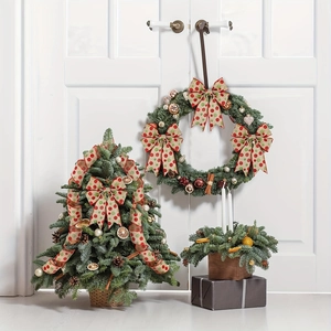 Nordic Christmas decor set with polka dot ribbons, wreath, and mini tree in rustic baskets