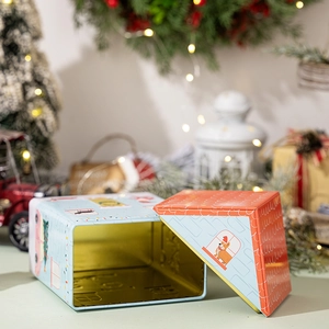 Blue Christmas dog house tin box for gift storage featuring festive corgi illustration