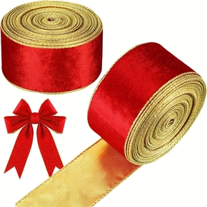 Detailed view of red velvet ribbon rolls with golden metallic edges for gift wrapping