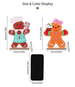 Size display of wooden gingerbread man figurines with lollipop and cupcake for Christmas