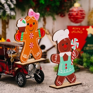 Set of two wooden Gingerbread Man Christmas tabletop ornaments with cupcake and lollipop