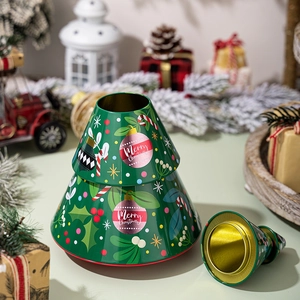 Christmas tree shaped tinplate candy box in green finish with festive holiday patterns