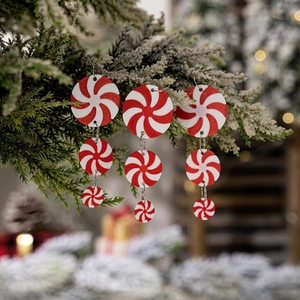 Three-tier red and white peppermint candy Christmas tree ornaments with glitter texture