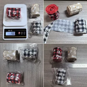 Tre rotoli di nastri a quadretti da 5 yard con impronte di ossa e zampe per Natale