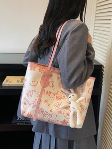 Cute large capacity canvas tote bag with pink straps and graffiti patterns for women