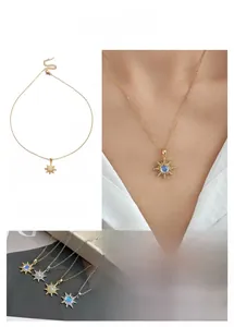 Detailed close-up of sunflower pendant with colorful center stone and micro-pave setting