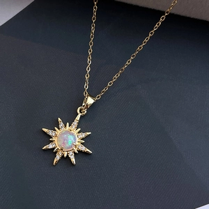 Elegant gold sunburst necklace with opal stone and sparkling zircon accents for women