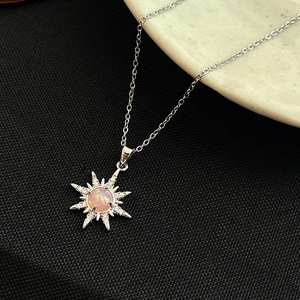 Elegant silver sunflower necklace with pink opal pendant and sparkling crystal pavé
